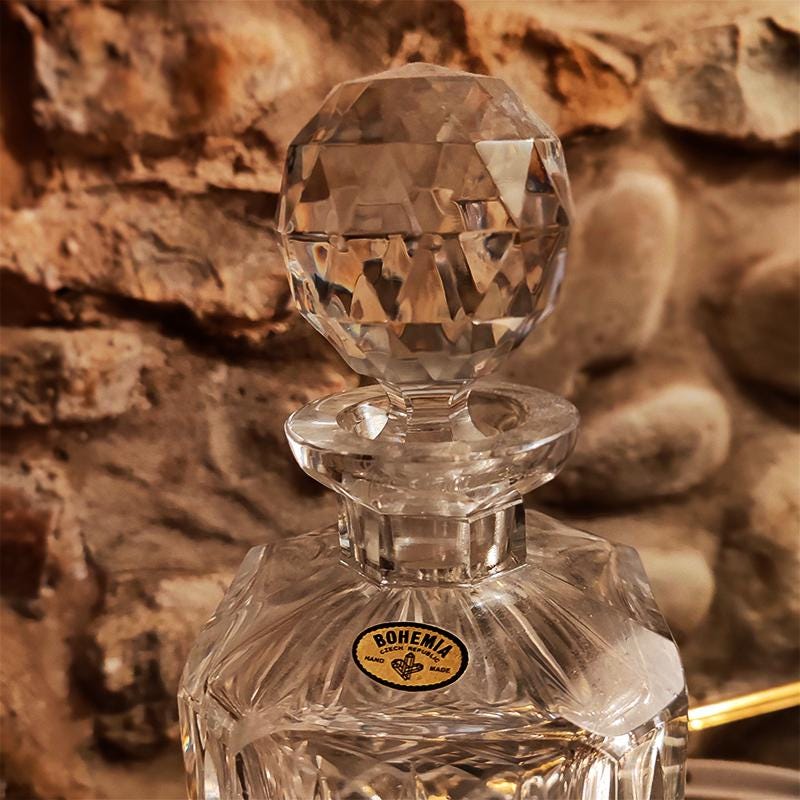 1960s Set with a Stunning Bottle and 6 Glasses in Hand-Worked Crystal of Bohemia with the Original Label.