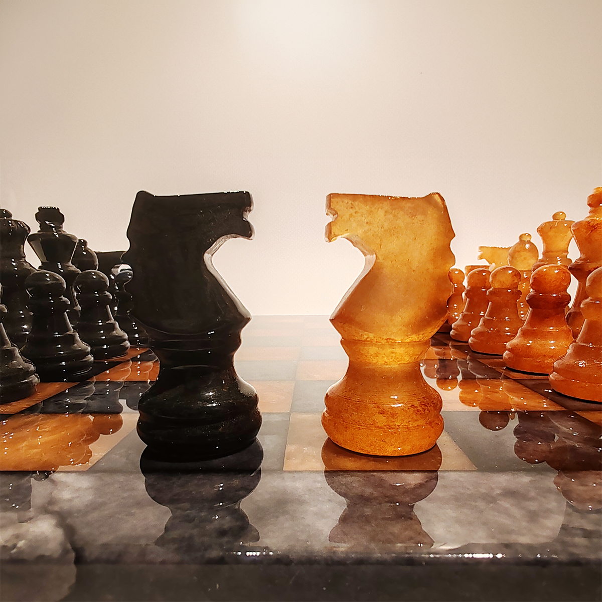 Chess Set in Hand carved Italian Alabaster of Volterra -  Black and Natural Agate 1970s