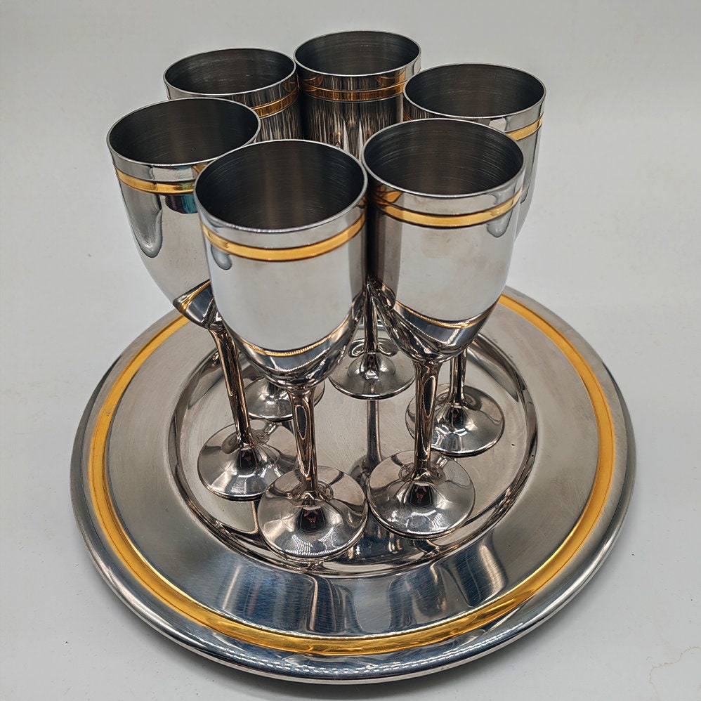 1970s Big Set with Ice Bucket, Tray and 6 Glasses by VEV in Stainless Steel and Gold.