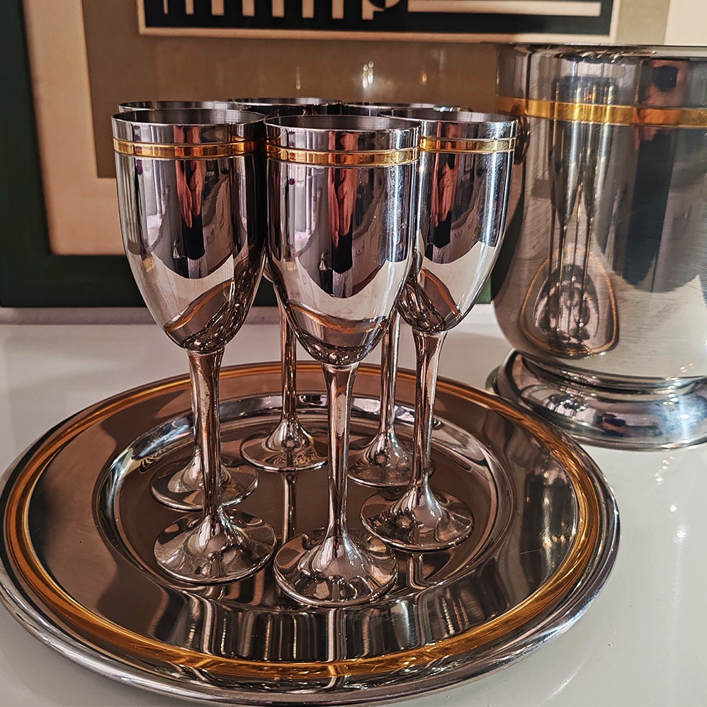 1970s Big Set with Ice Bucket, Tray and 6 Glasses by VEV in Stainless Steel and Gold.