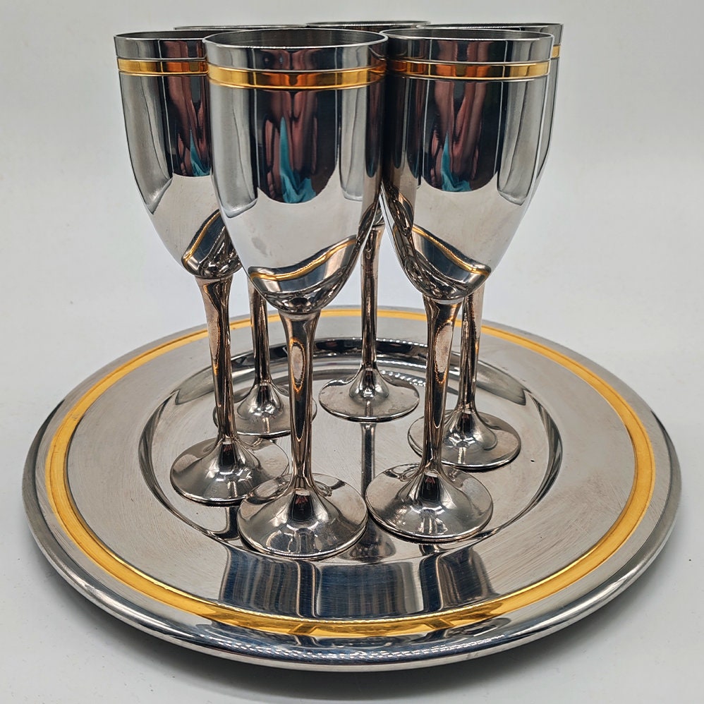 1970s Big Set with Ice Bucket, Tray and 6 Glasses by VEV in Stainless Steel and Gold.