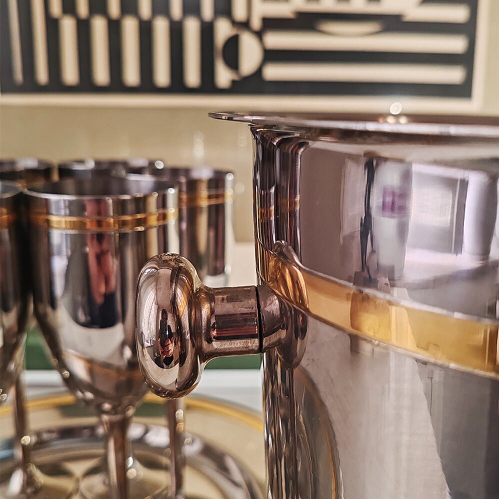 1970s Big Set with Ice Bucket, Tray and 6 Glasses by VEV in Stainless Steel and Gold.