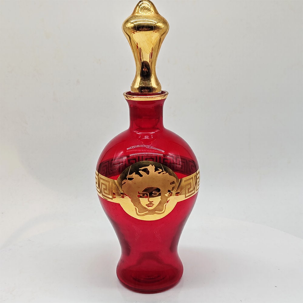 1960s Wonderful Jellyfish drawing Bottle and 4 Glasses with fine Golden finishes in Murano Glass. Made in Italy.