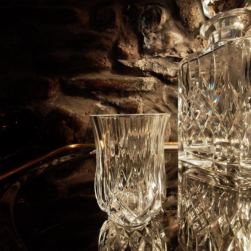 1960s Set with a Stunning Bottle and 6 Glasses in Hand-Worked Crystal of Bohemia with the Original Label.