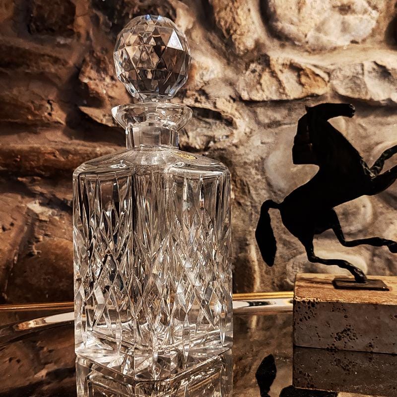 1960s Set with a Stunning Bottle and 6 Glasses in Hand-Worked Crystal of Bohemia with the Original Label.