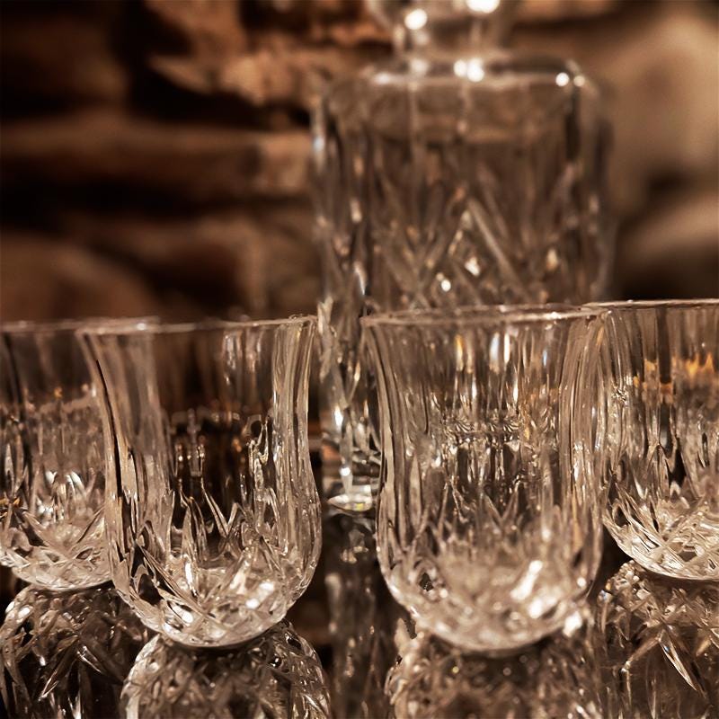 1960s Set with a Stunning Bottle and 6 Glasses in Hand-Worked Crystal of Bohemia with the Original Label.