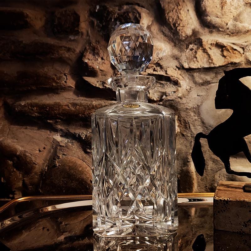 1960s Set with a Stunning Bottle and 6 Glasses in Hand-Worked Crystal of Bohemia with the Original Label.