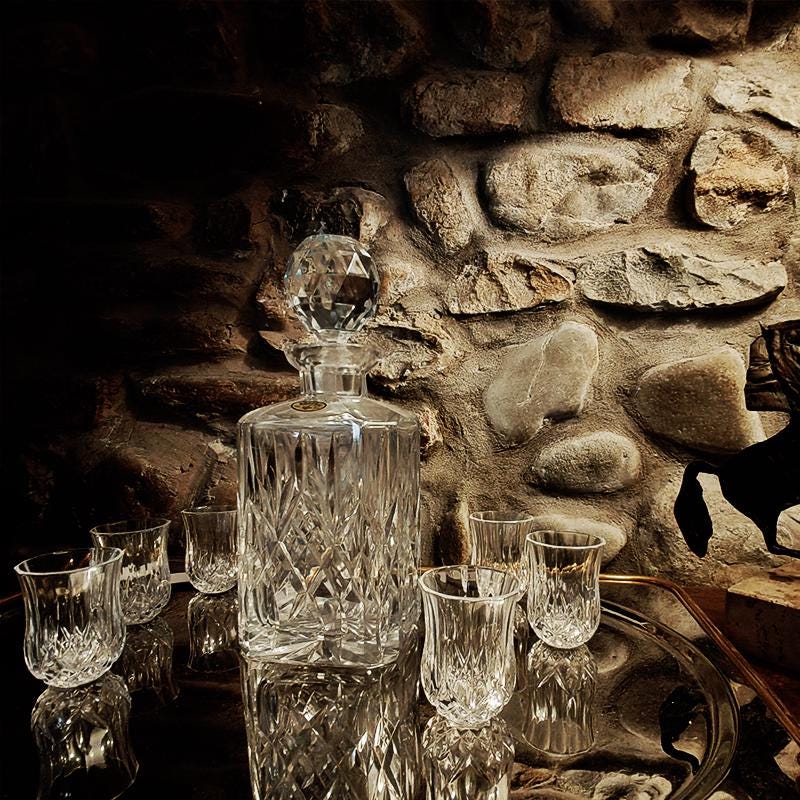 1960s Set with a Stunning Bottle and 6 Glasses in Hand-Worked Crystal of Bohemia with the Original Label.