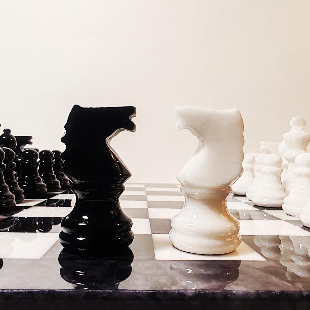 1970s Stunning Chess Set in Genuine Hand Carved Alabaster of Volterra - Black and White - Made in Italy