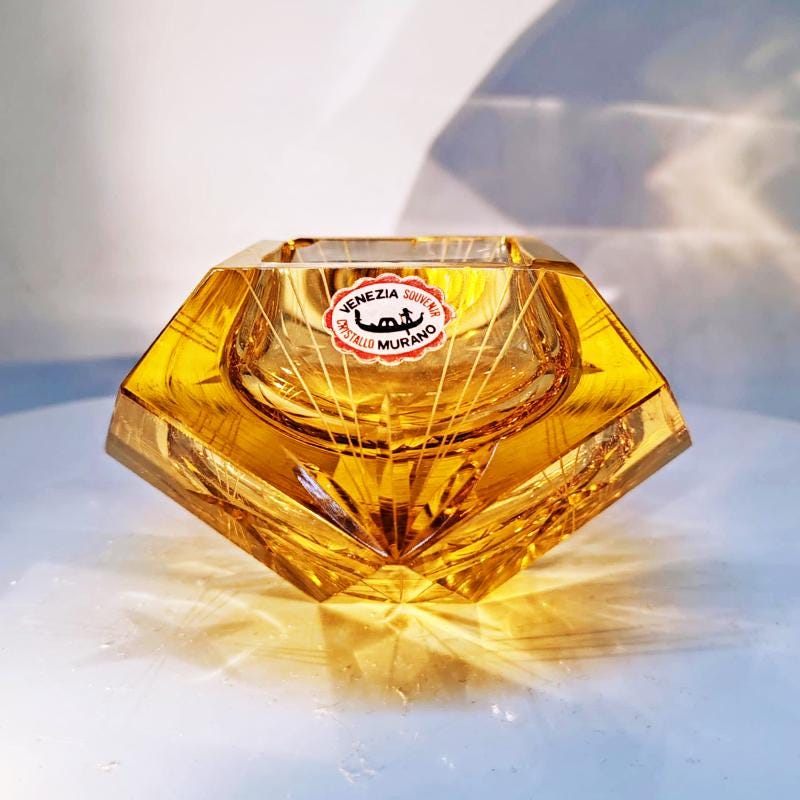 1960s Rare Gold Multifaceted Ashtray or Catch-all in Murano Glass by Flavio Poli for Seguso. Made in Italy.