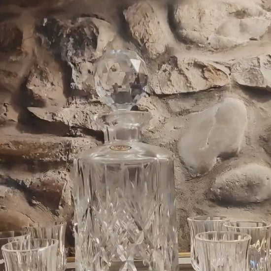 1960s Set with a Stunning Bottle and 6 Glasses in Hand-Worked Crystal of Bohemia with the Original Label.